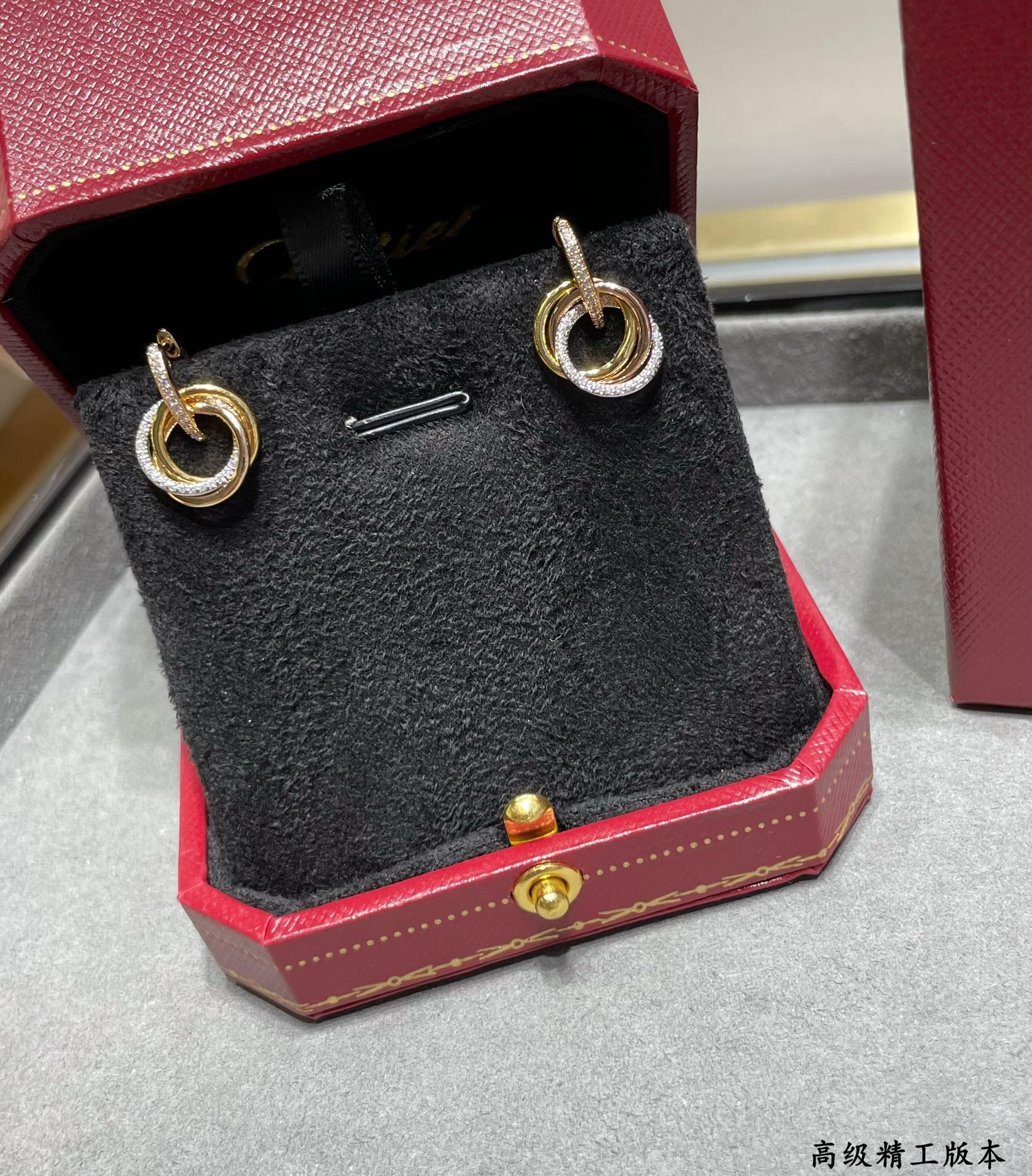 Ca*t*er Small size triple-ring diamond Earrings