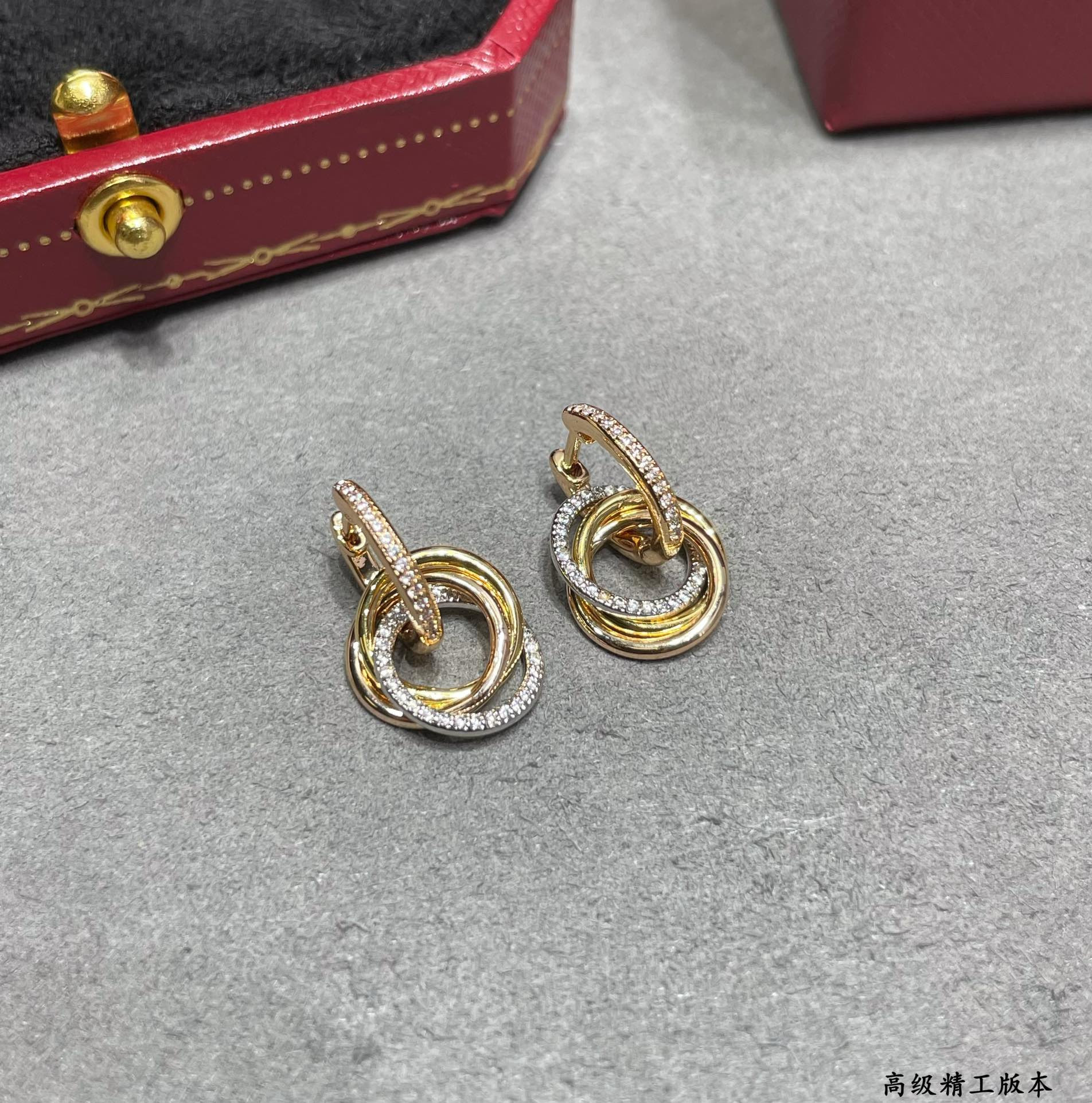 Ca*t*er Small size triple-ring diamond Earrings