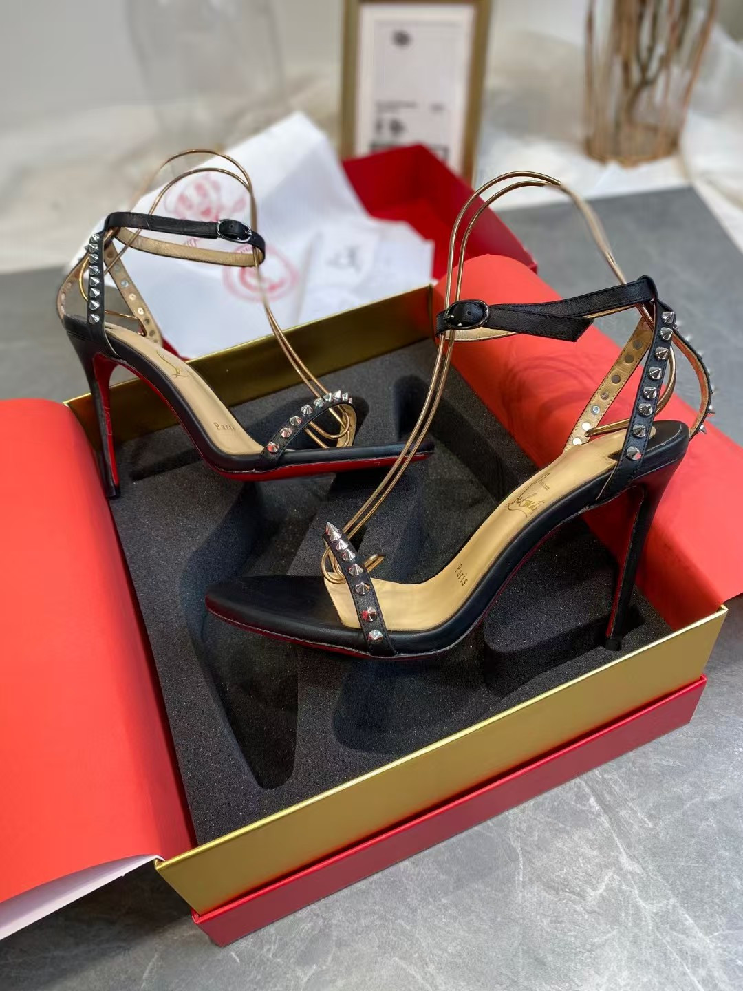 UA Ch**an Louboutin So Me Spike Strappy Sandals