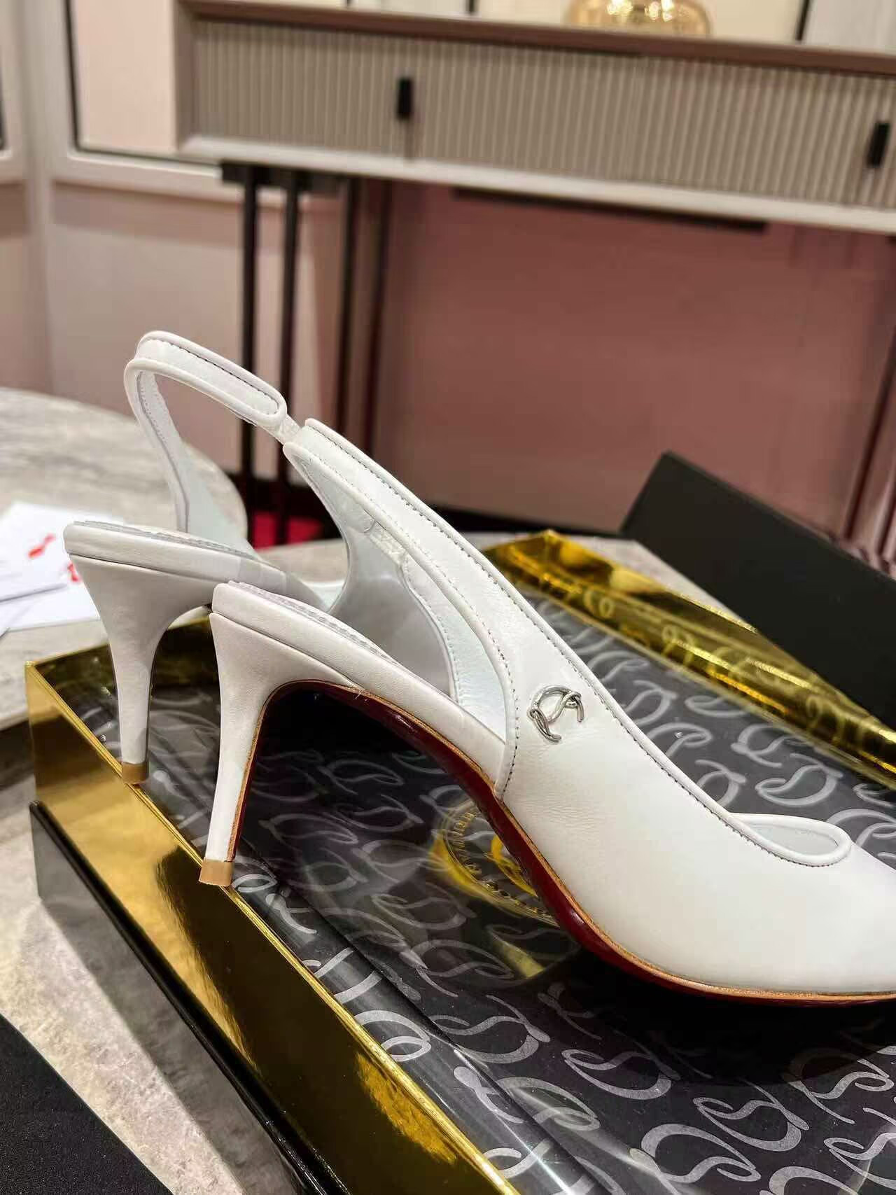 UA Ch**an Louboutin Sporty Kate Sling 65mm