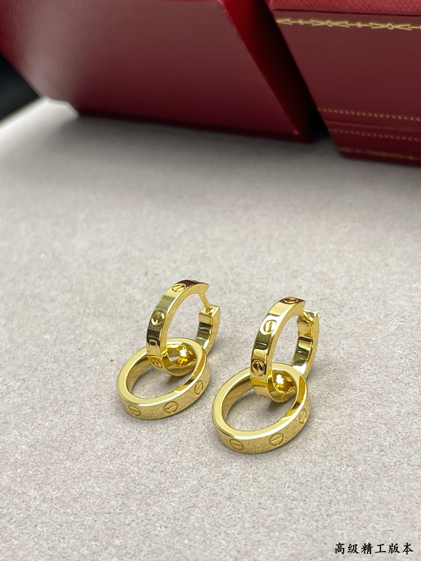 Ca*t*er Double Ring Polished Earrings