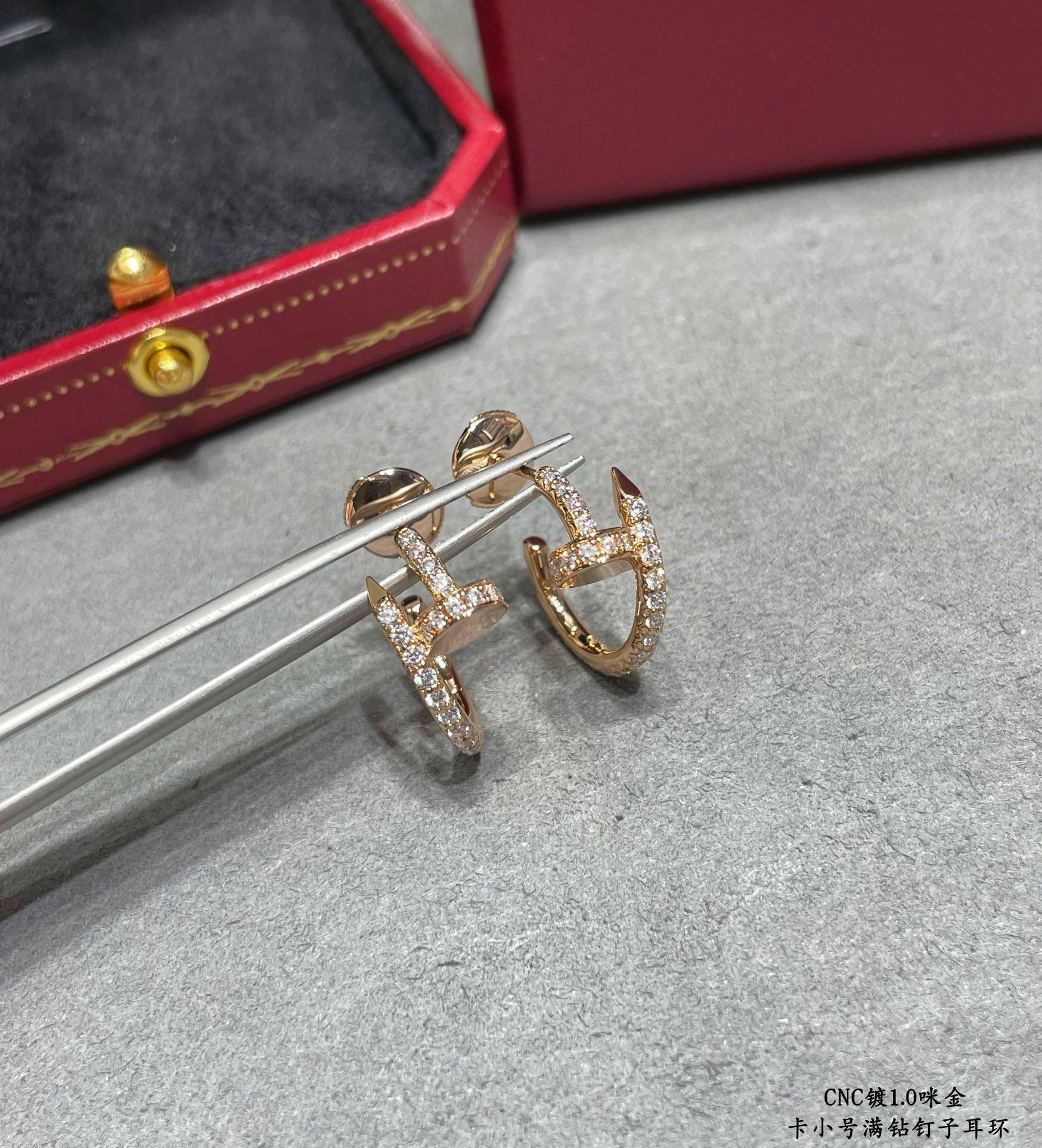 Ca*t*er Fully diamond-encrusted small nail Earrings