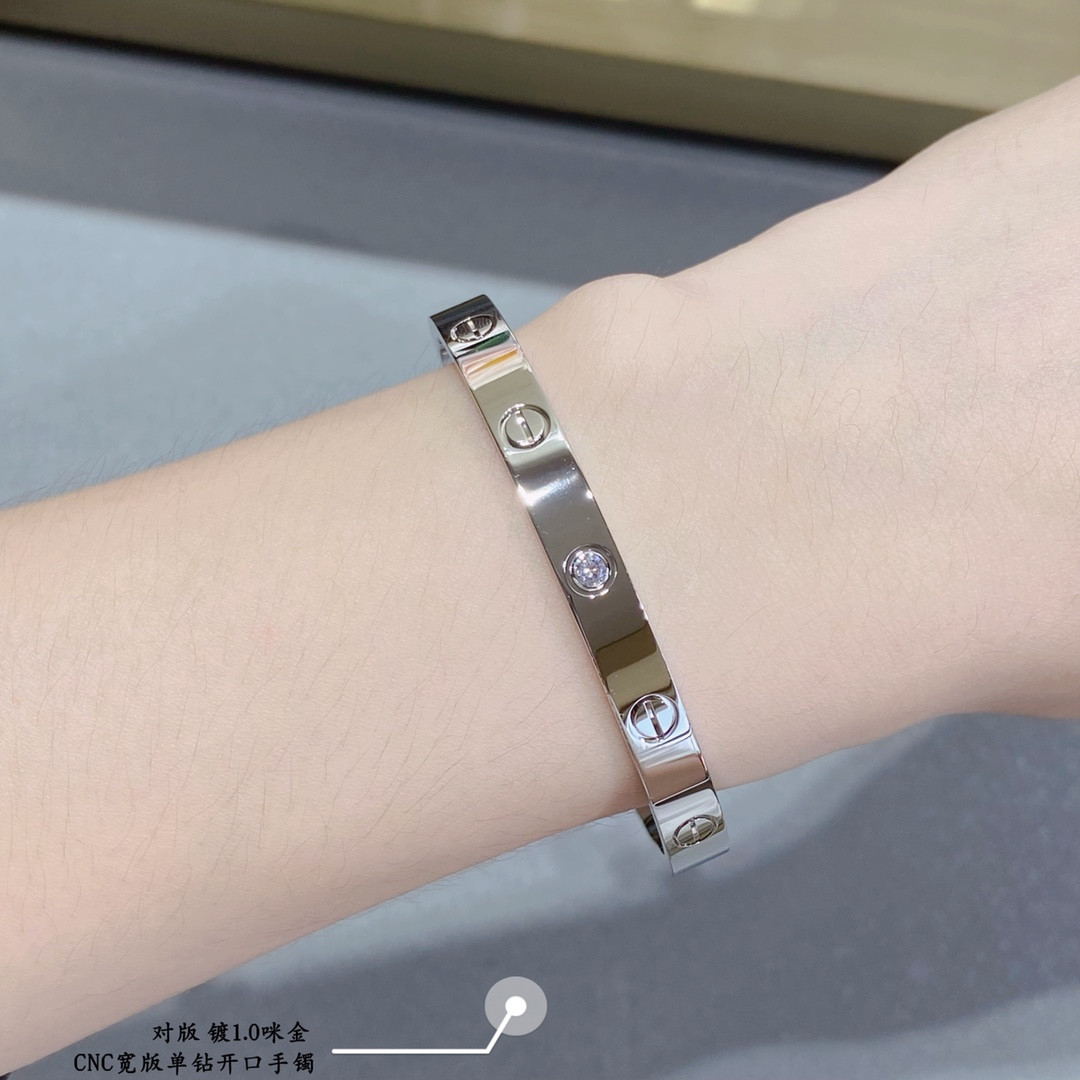 Ca*t*er wide single diamond open LOVE Bracelet