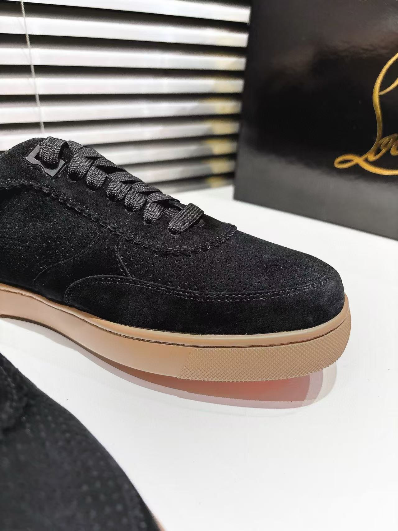 UA Ch**an Louboutin Sneaker