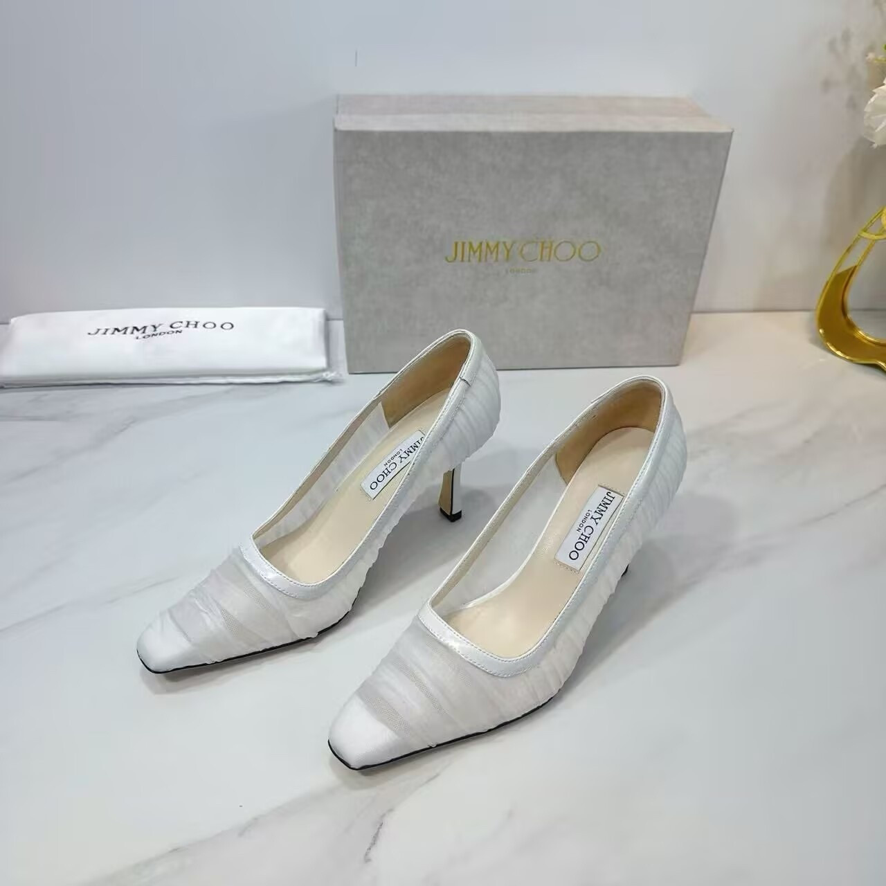 UA Ji*y Ch* Ivory Tulle and Nappa Pumps