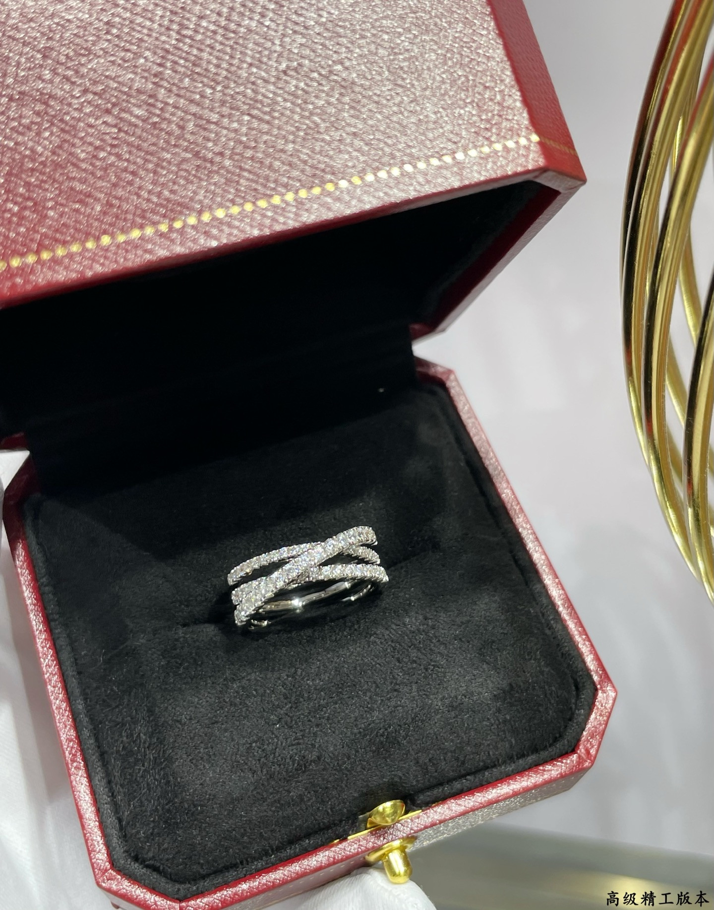 Ca*t*er Three-ring rivet diamond ring