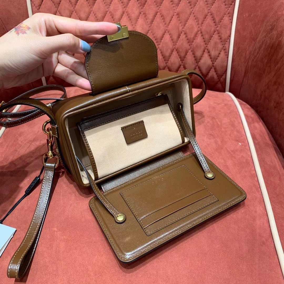 G*u*i GG mini bag with clasp closure