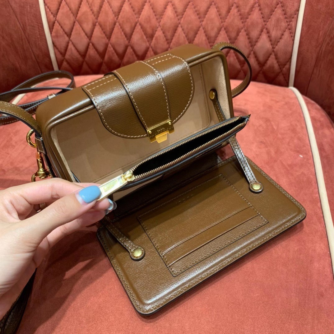 G*u*i GG mini bag with clasp closure