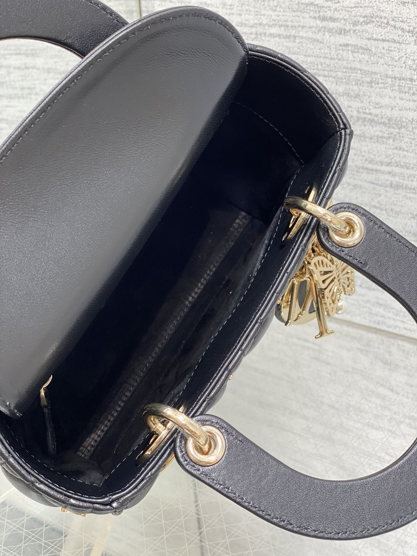 SMALL LADY D*0r Black with Butterfly Studs