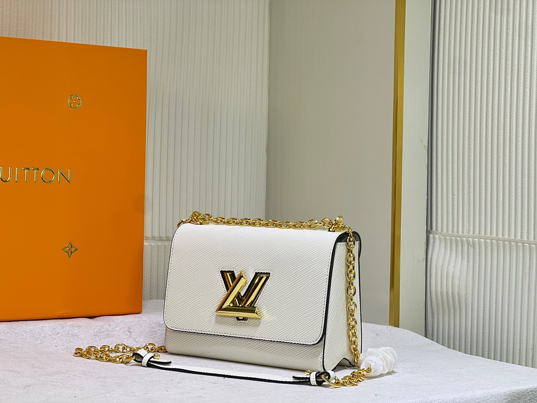 L0*is V*t0n Twist MM white 9.1 x 6.7 x 3.7 inches