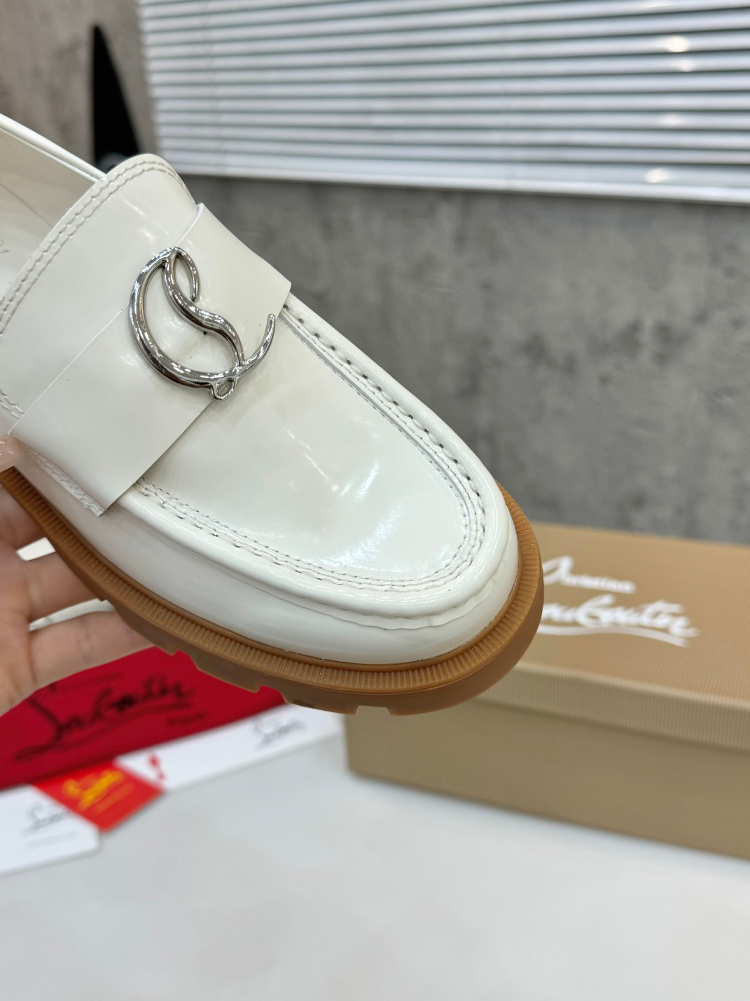 UA Ch**an Louboutin(CL) logo design,the latest runway version of the red-soled shoes