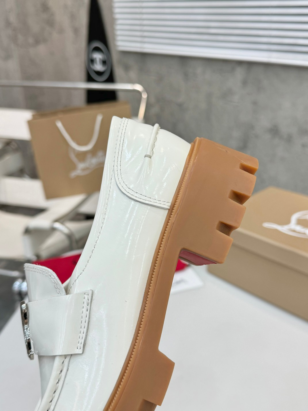 UA Ch**an Louboutin(CL) logo design,the latest runway version of the red-soled shoes