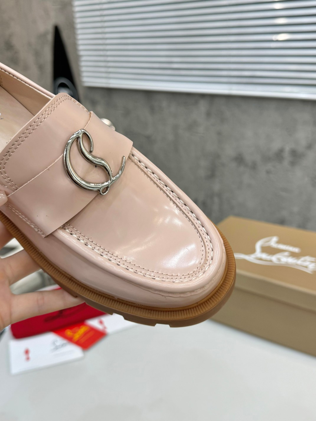 UA Ch**an Louboutin(CL) logo design,the latest runway version of the red-soled shoes