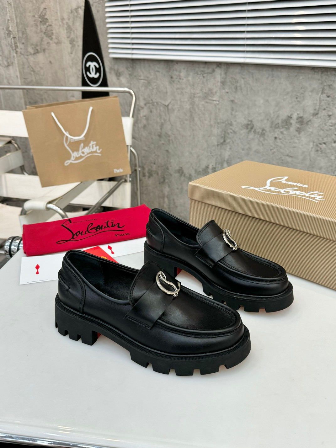 UA Ch**an Louboutin(CL) logo design,the latest runway version of the red-soled shoes