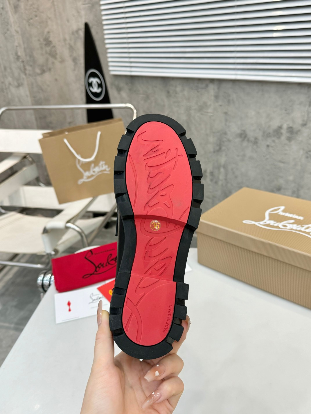 UA Ch**an Louboutin(CL) logo design,the latest runway version of the red-soled shoes
