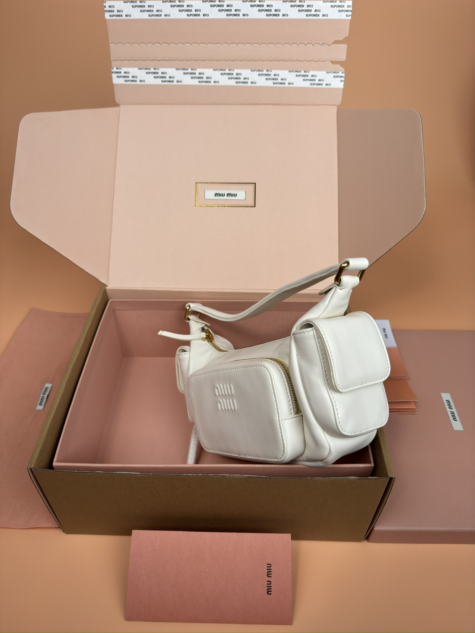 Miu Miu Hobo Nappa leather pocket bag  12x21x6cm