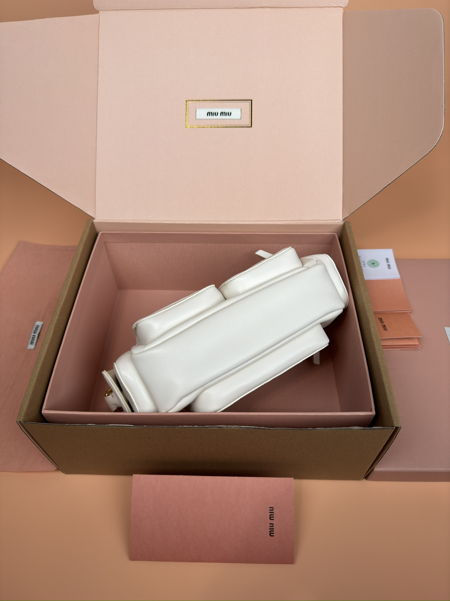 Miu Miu Hobo Nappa leather pocket bag  12x21x6cm