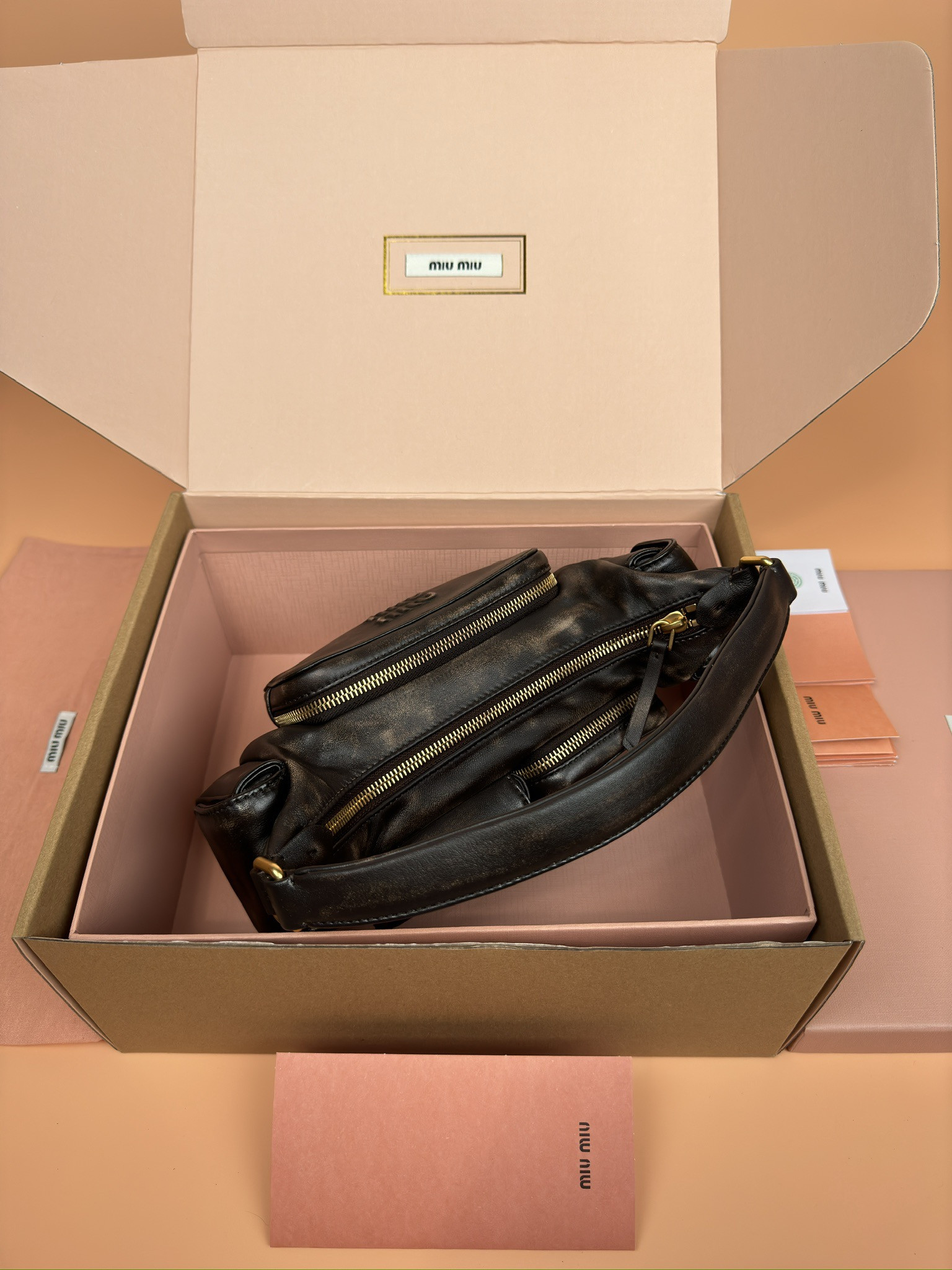 Miu Miu Hobo Nappa leather pocket bag 12x21x6cm