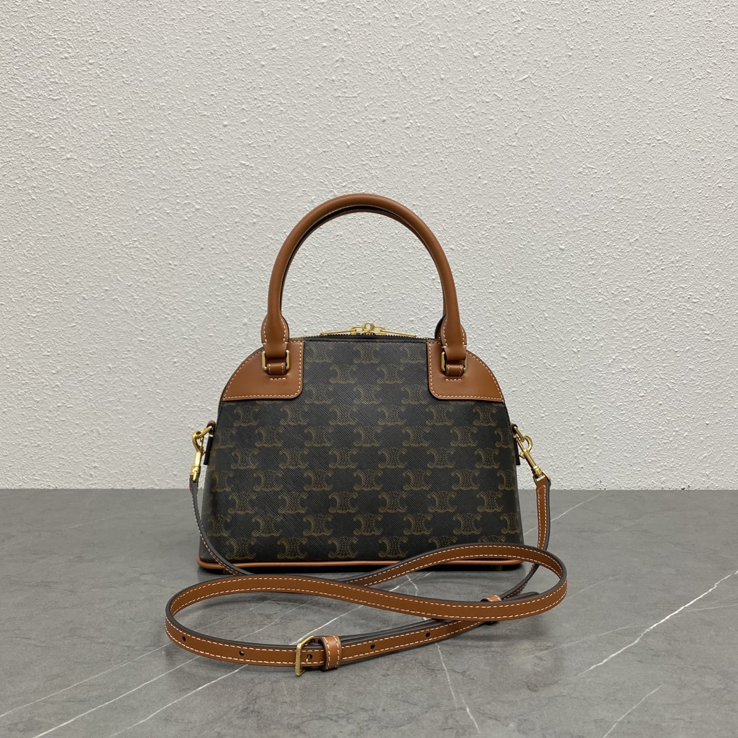 Ce**e Small Bowling in Triomphe canvas and calfskin 25x17x10cm